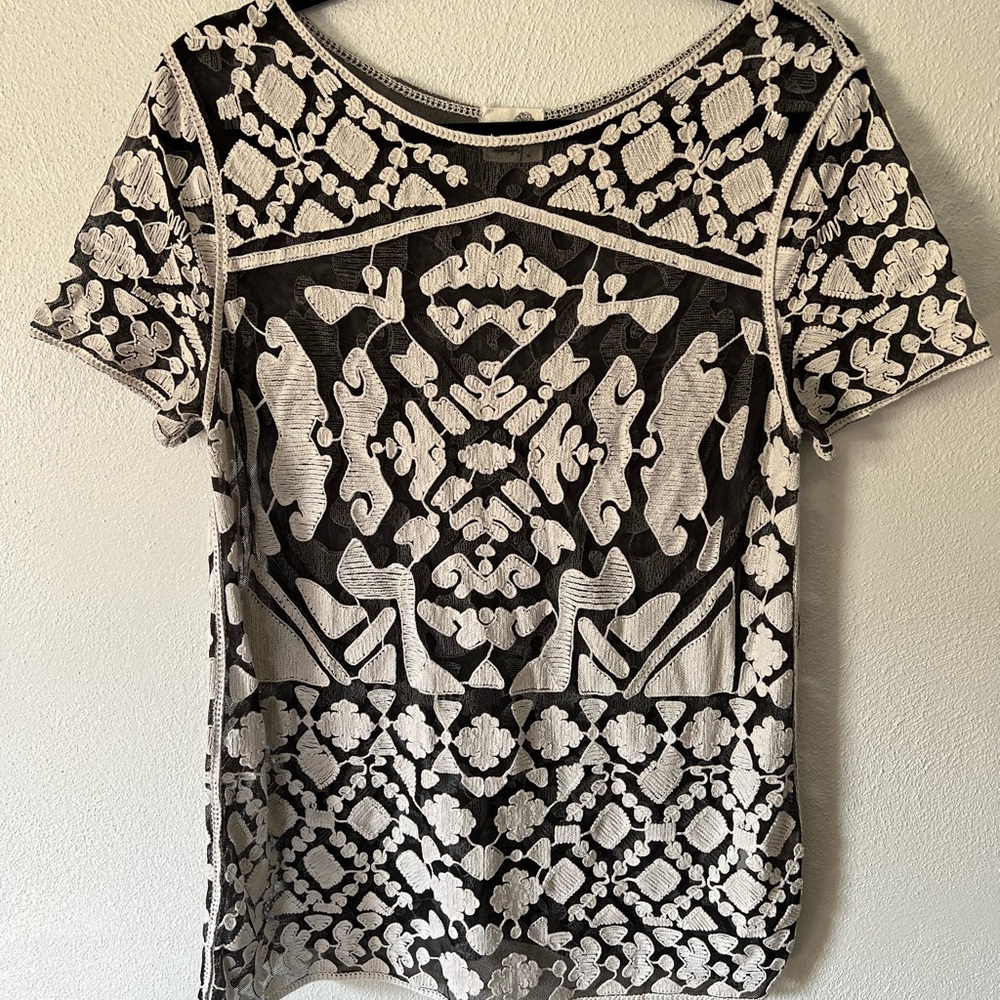 Anthropologie embroidered top, size Medium.